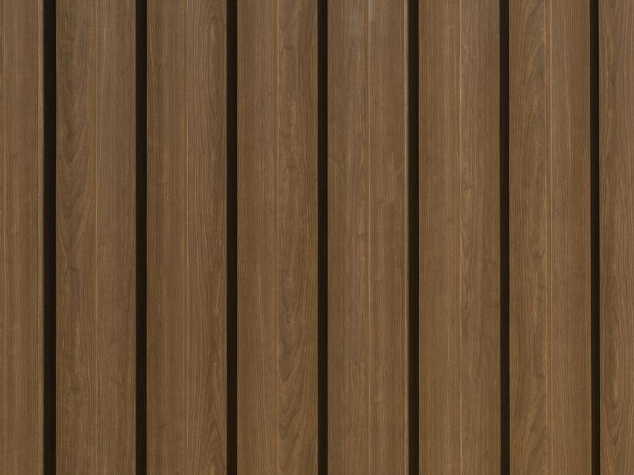 Close-up of medium-brown woodgrain steel fence sheets