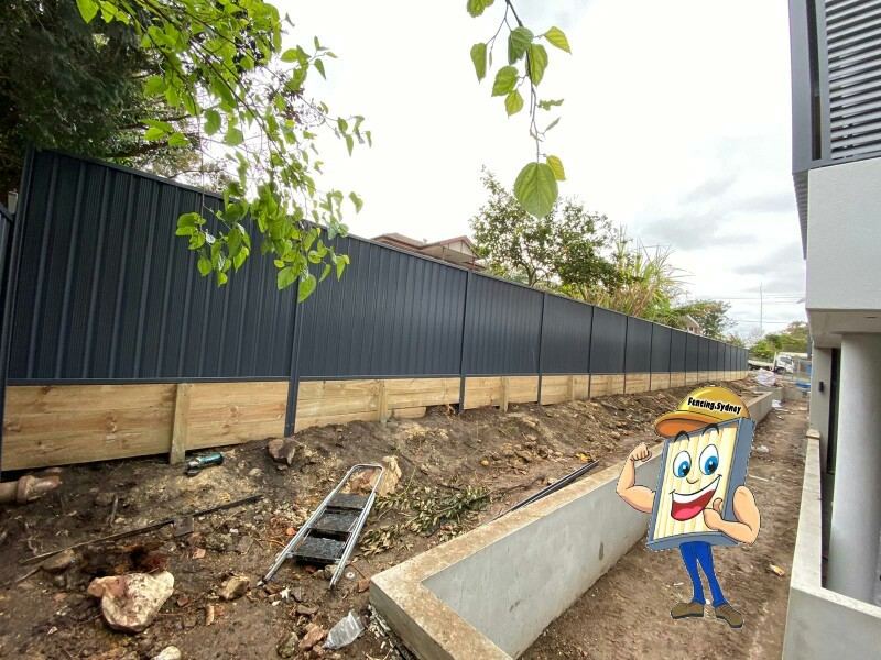 Retaining walls under fences