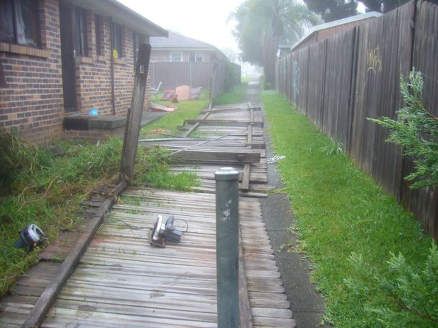 Demolition and removal of an existing fence