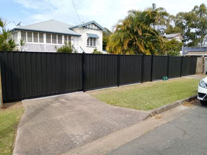 Black Ash woodgrain fence and sliding gate
