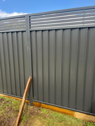 Close view of mid grey Colorbond corrugated sheets showing the rib profile