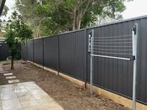 Monument Colorbond fence with temporary bracing