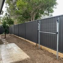 Monument Colorbond fence with temporary bracing