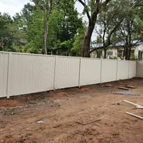 White Colorbond fence on a cleared block
