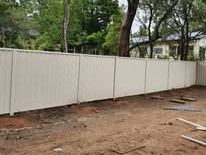 White Colorbond fence on a cleared block