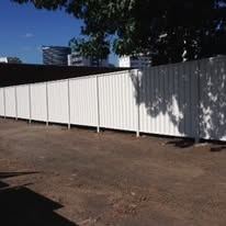 White Colorbond fence on a new build site
