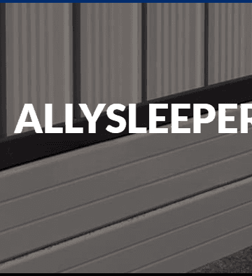 Close view of Colorbond sheets sitting above an aluminium sleeper retaining system