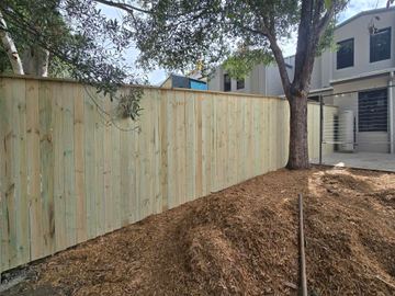 New treated pine palings on a residential block.