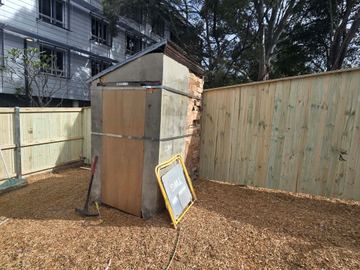 New treated pine palings on a residential block.