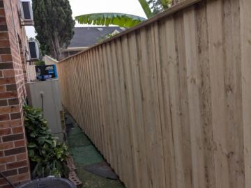 New treated pine palings on a residential block.