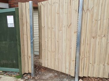 New treated pine palings on a residential block.