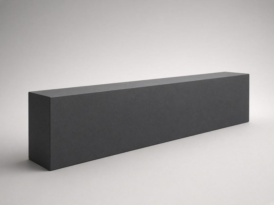 Smooth charcoal concrete retaining-wall sleeper on a studio backdrop