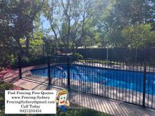 Black flat top tubular fencing install